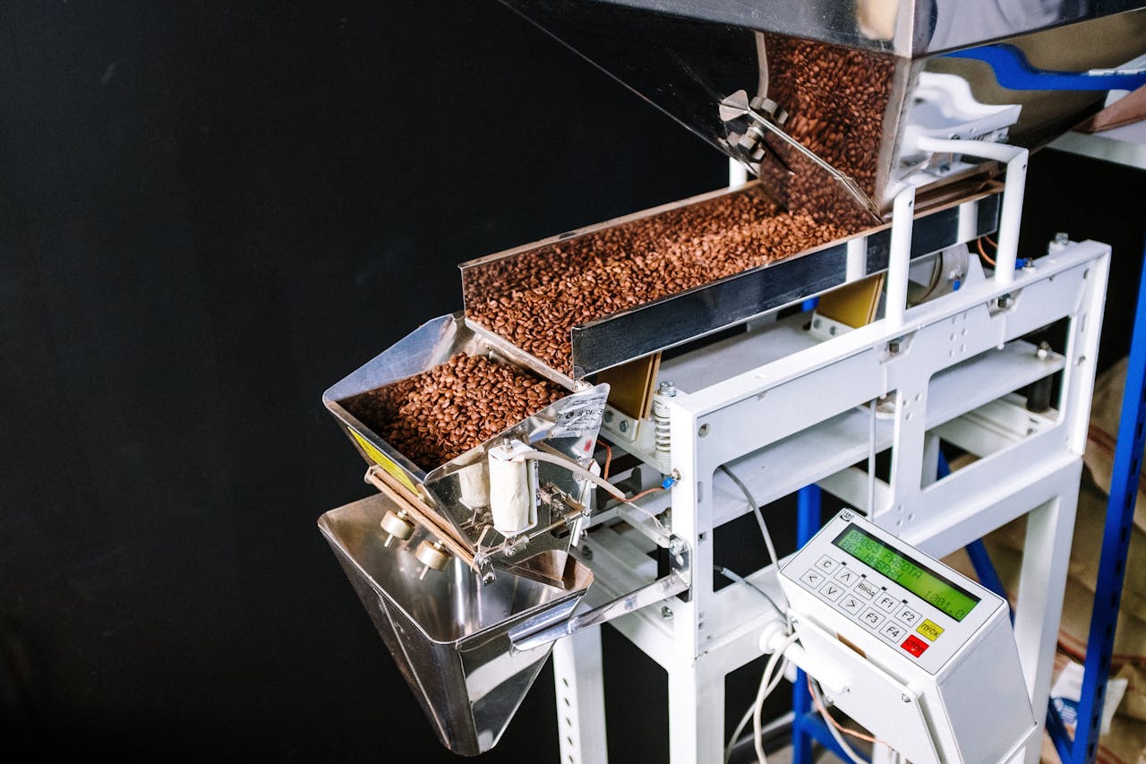 digital Automated machine sorting roasted coffee beans with control panel for efficient production.
